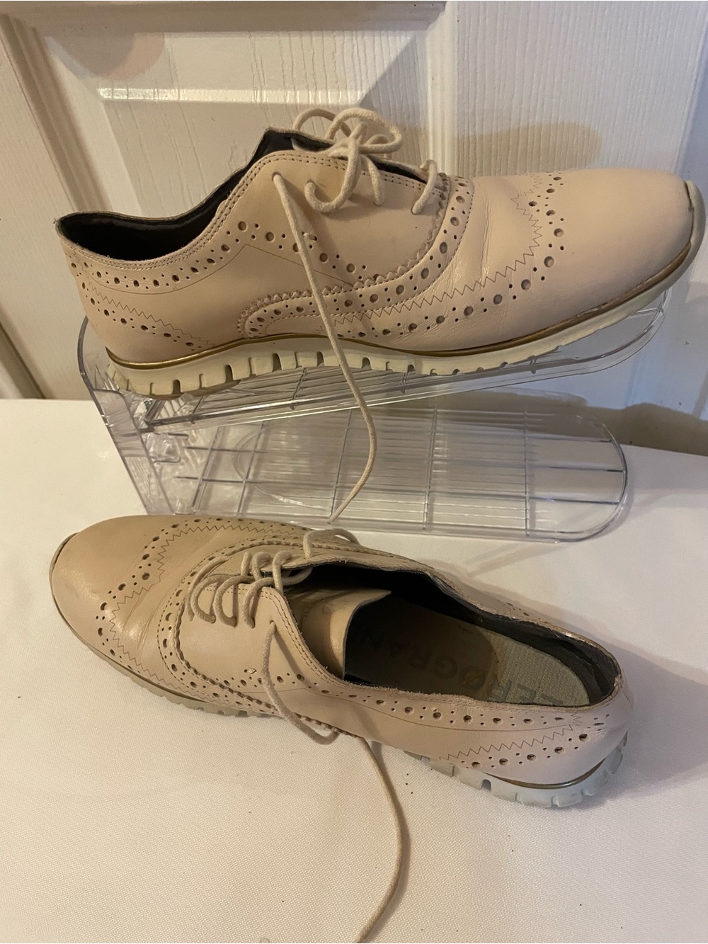 Cole Haan 
Cream Wingtip Oxford Derby shoes for women’s